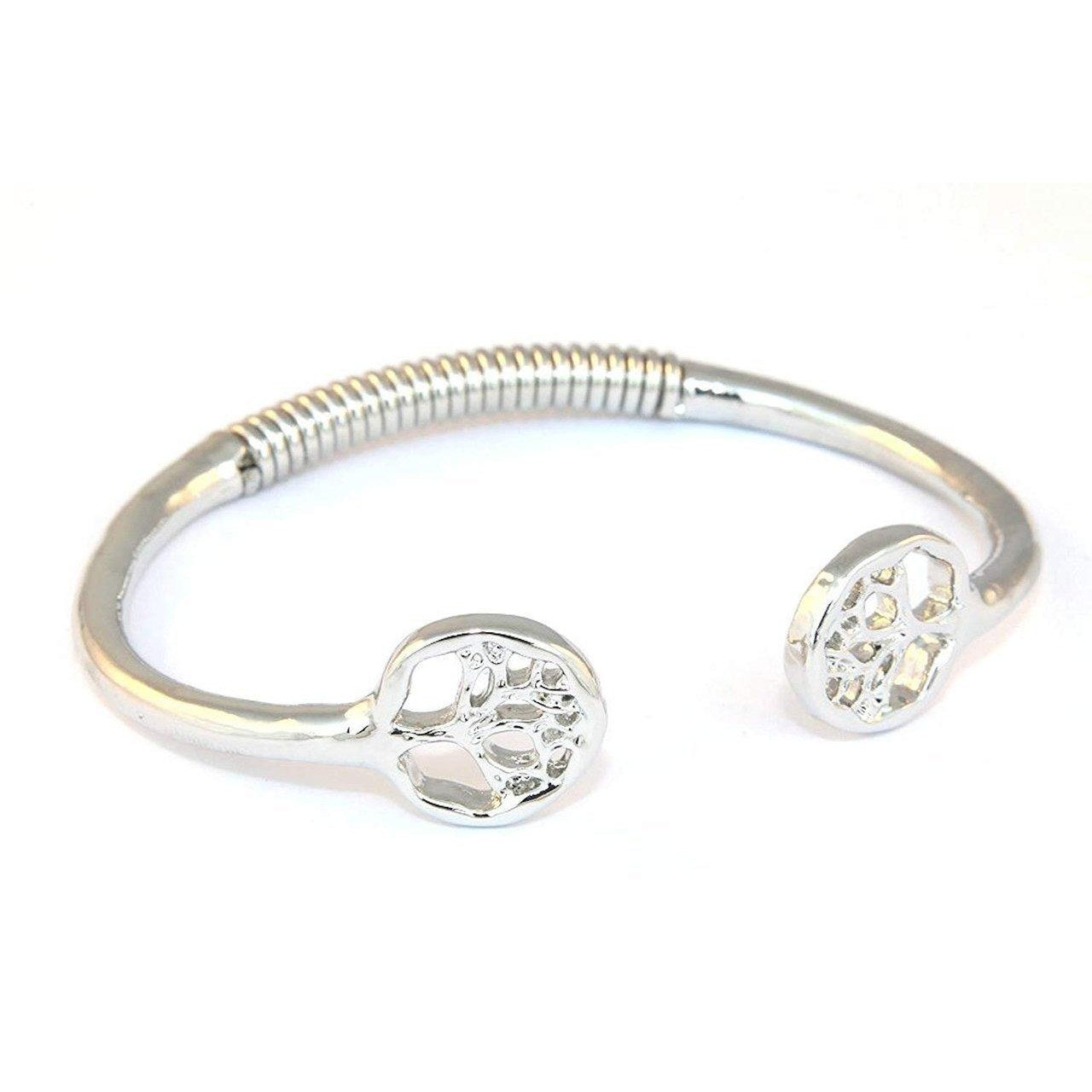 Semi spring loaded bangle, highly polished with tree design on 2 ends.-0
